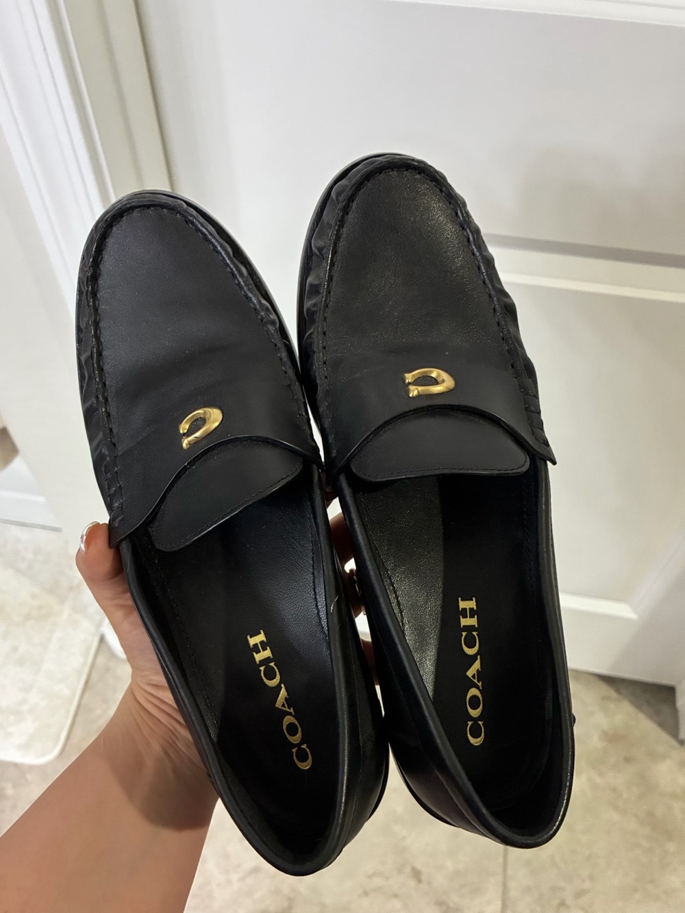 Coach Black Leather Slip-On Loafers with Gold Accent